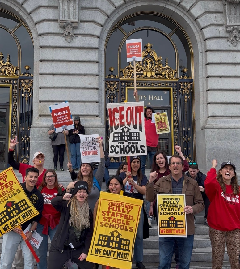 Triumphant strikers in front of city hall
