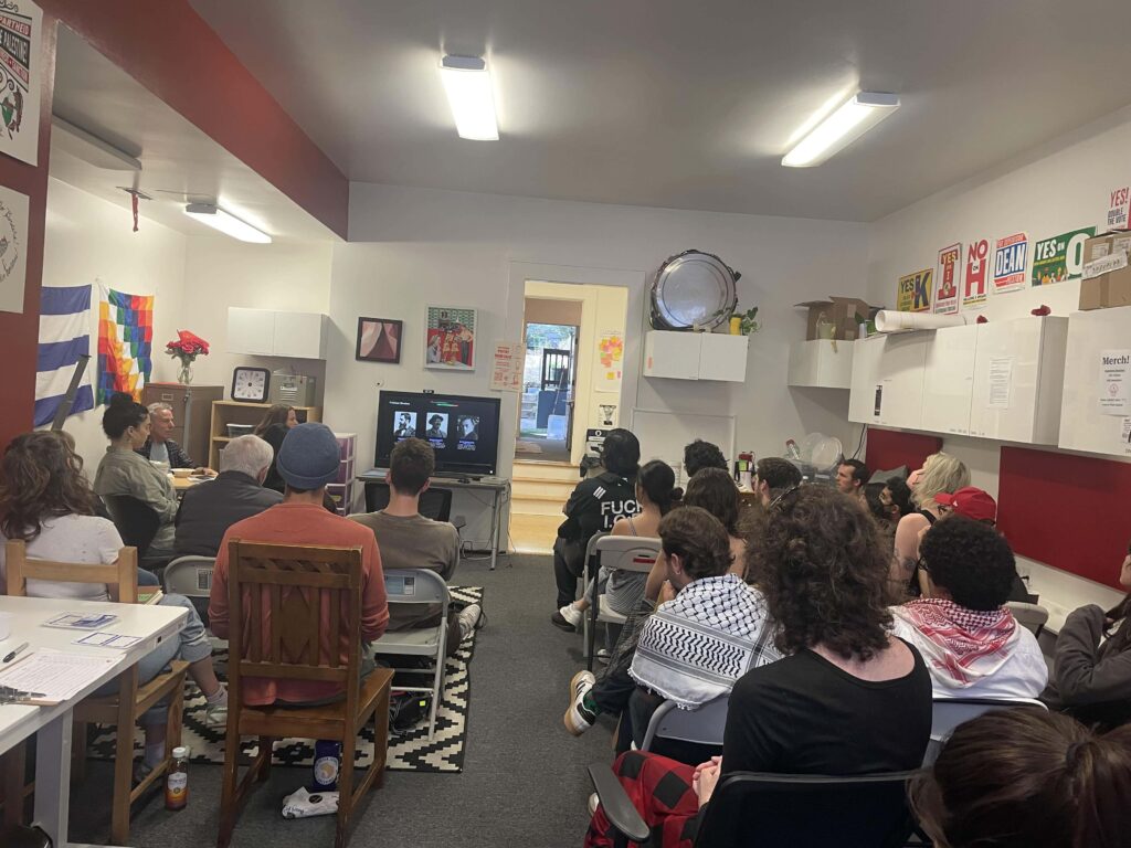 Photo of comrades participating in the Understanding Zionism education event